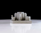 Model of a Robarts Library of Toronto University on a reflective surface with a black background